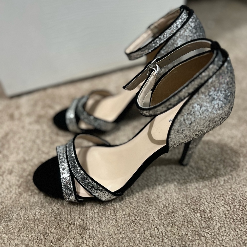 Brand new Black and silver heels